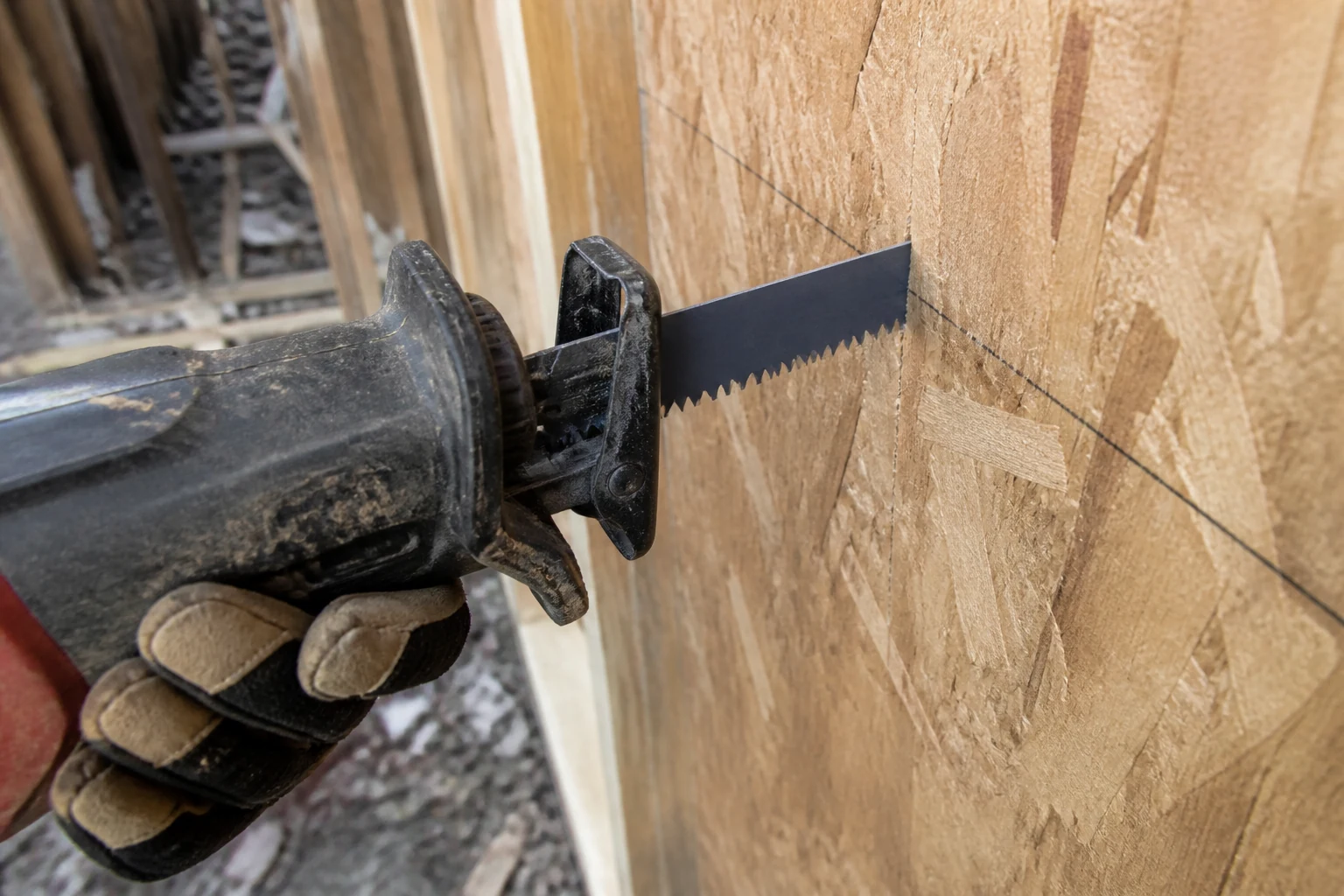 Plunge start into wood sheathing with reciprocating saw